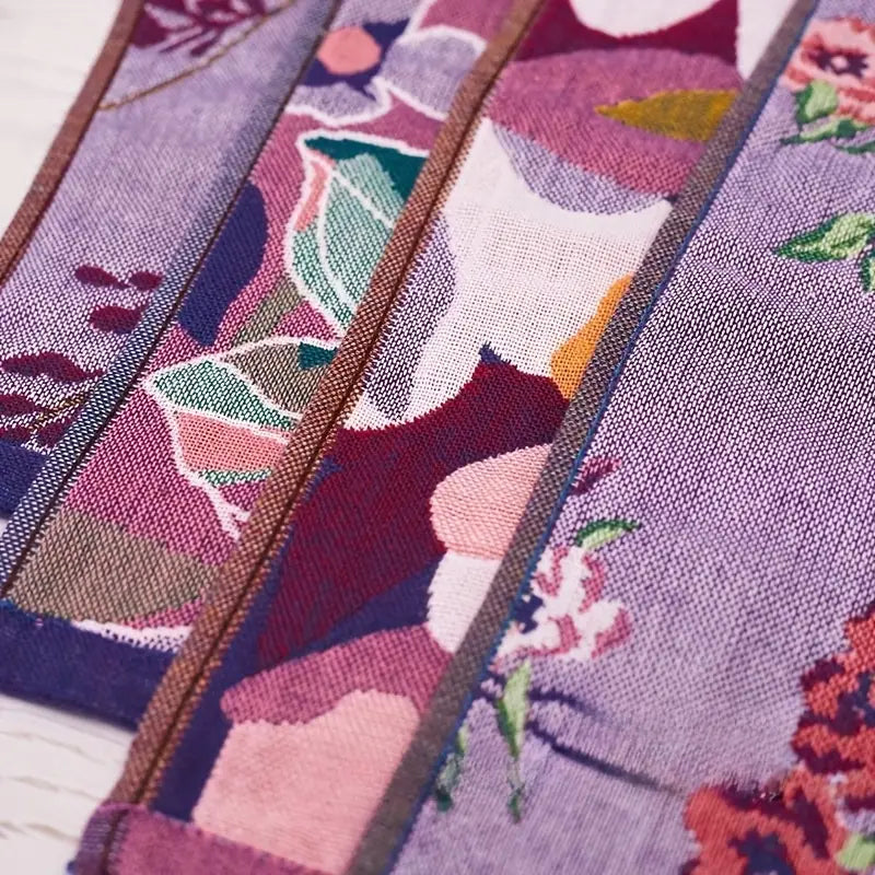 Close-up of floral-patterned fabric strips in various colors.