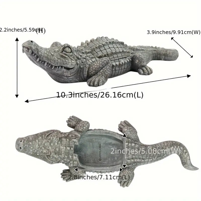 Measurement chart of a crocodile figurine with dimensions labeled.