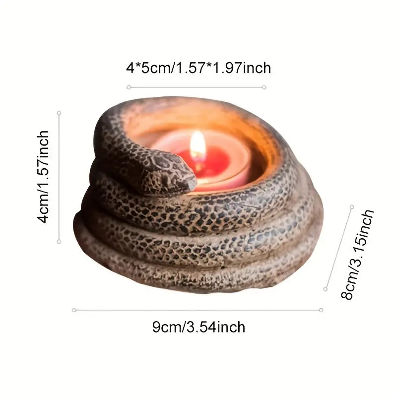 Ceramic snake-shaped candle holder with a lit candle, showing dimensions on a white background.